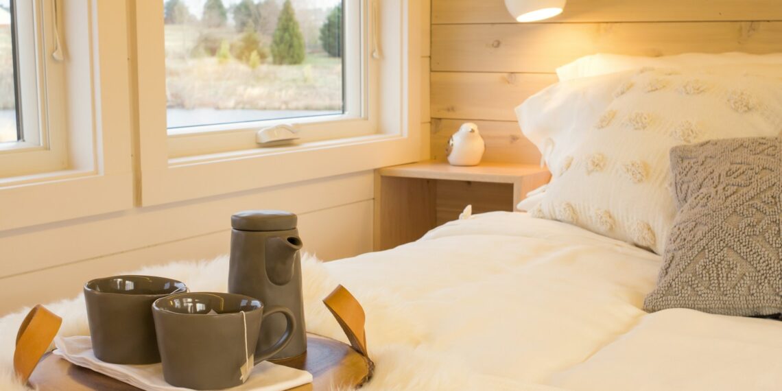black ceramic mug on brown wooden table